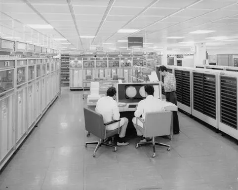 People in the computers room (tape view)